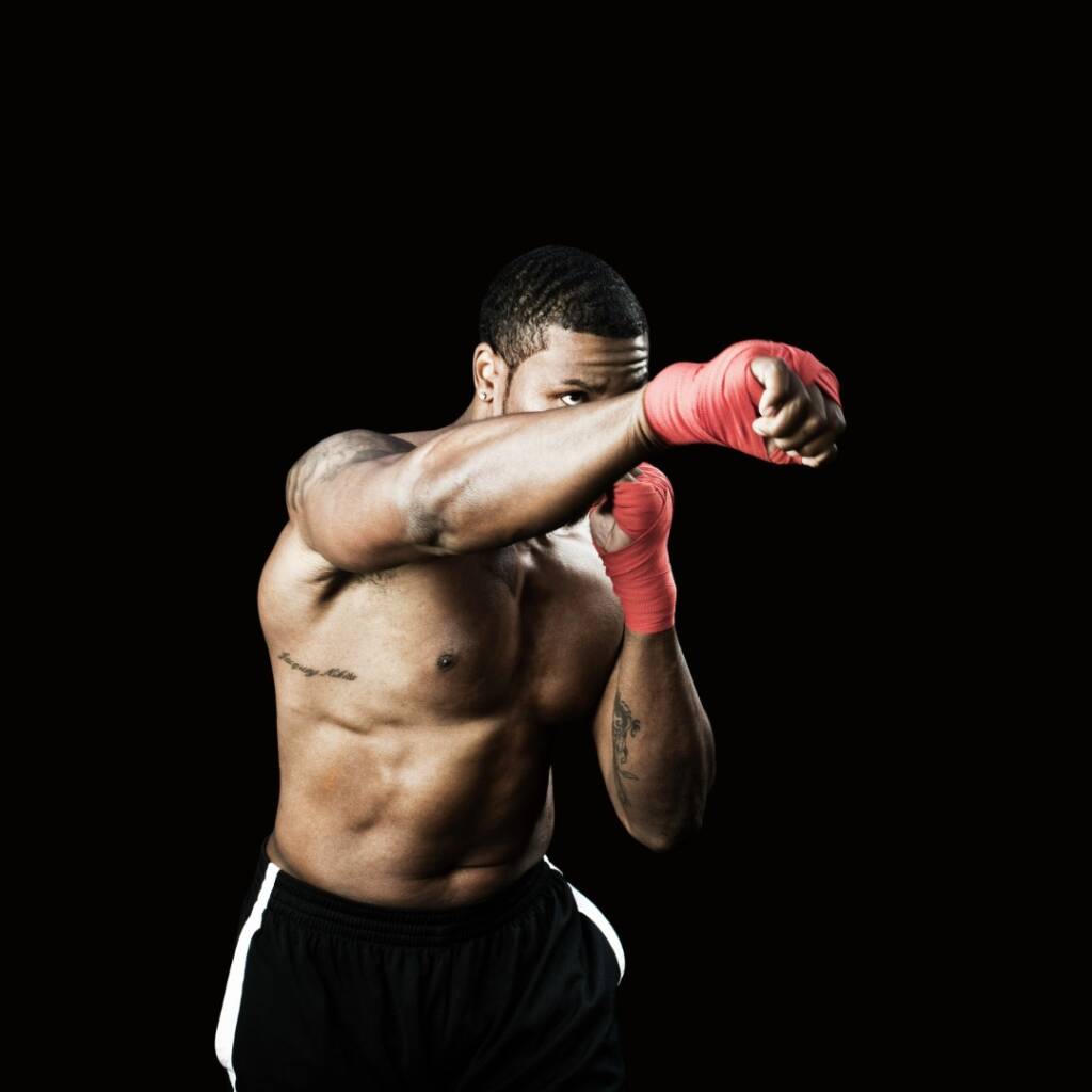 men-doing-boxing-with-black-background