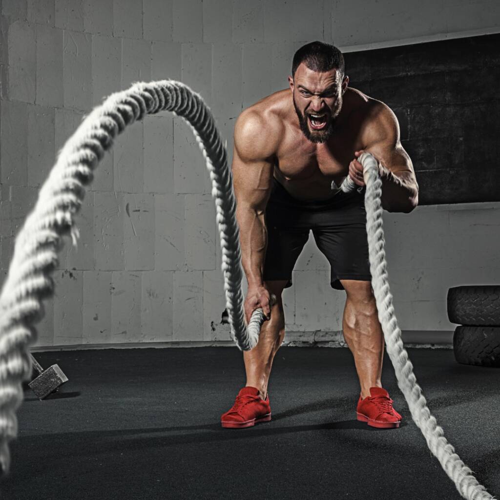men-doing-rope-exercise-at-the-gym