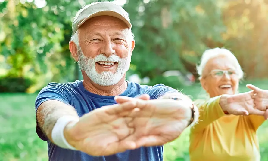 Outdoor senior fitness woman man lifestyle active sport exercise healthy fit retirement